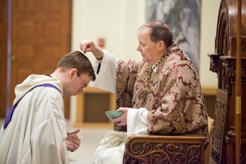 Abbot distributes ashes